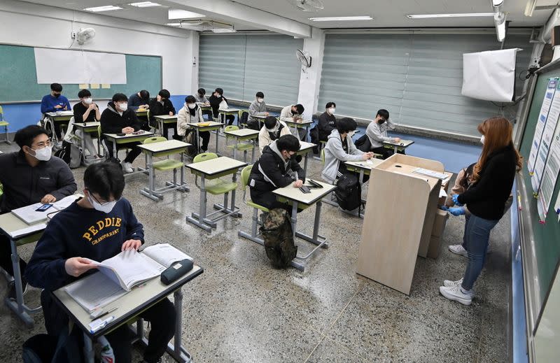 South Korea sees record jump in Covid-19 cases as thousands take college exam